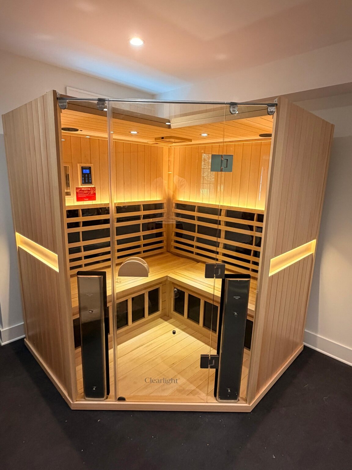 Glass-front home sauna assembled and installed
